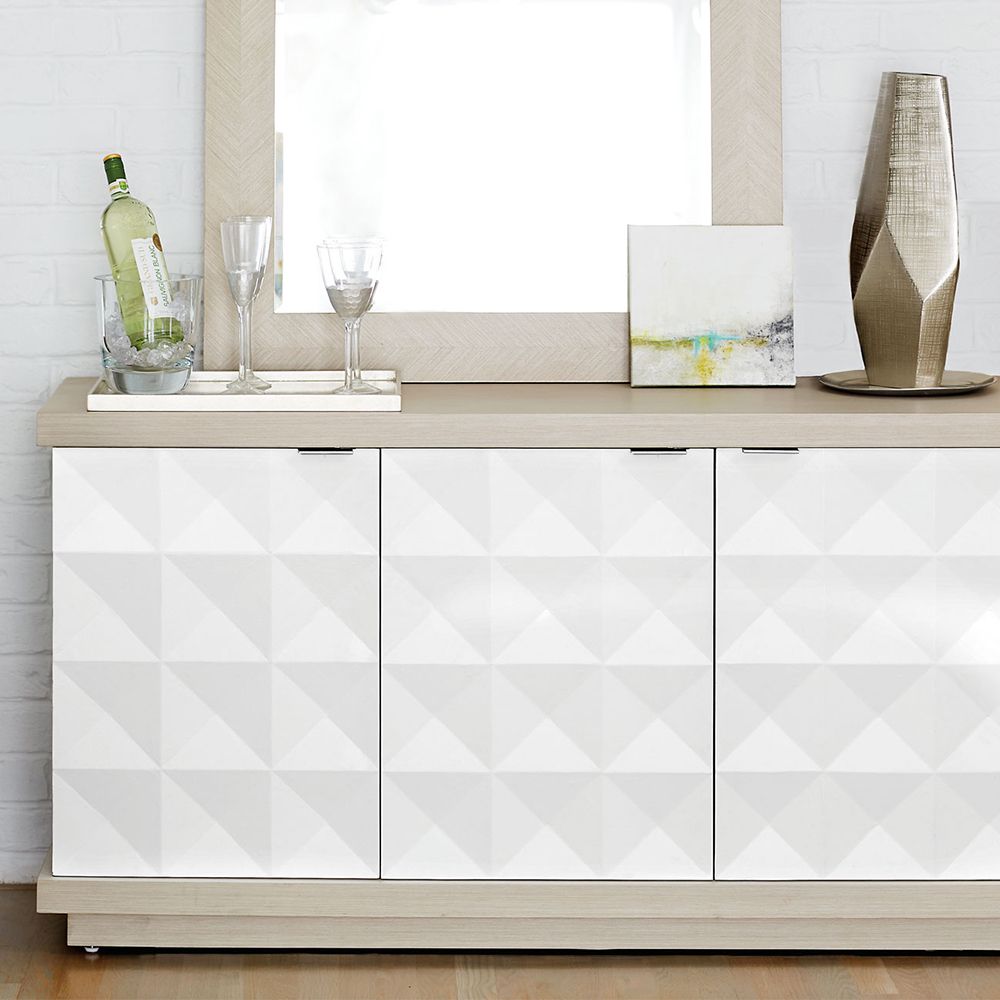 A sophisticated four door geometric patterned buffet with internal shelves and drawers