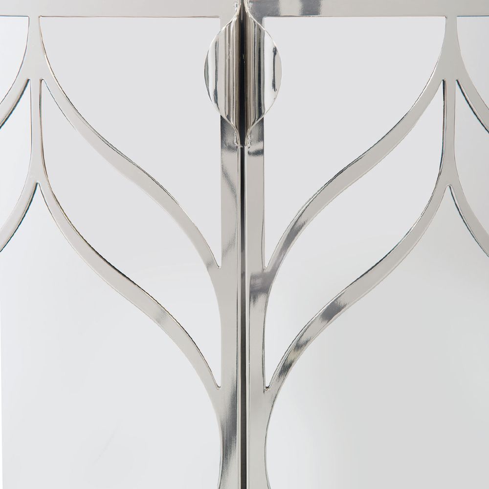 A dazzling buffet with three mirrored glass doors featuring decorative stainless steel overlays and an abundance of internal storage 