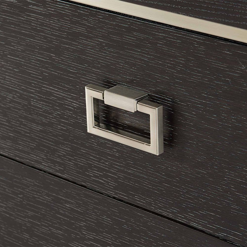A stylish eight drawer dresser from Bernhardt with a dark brown finish and stainless steel frame