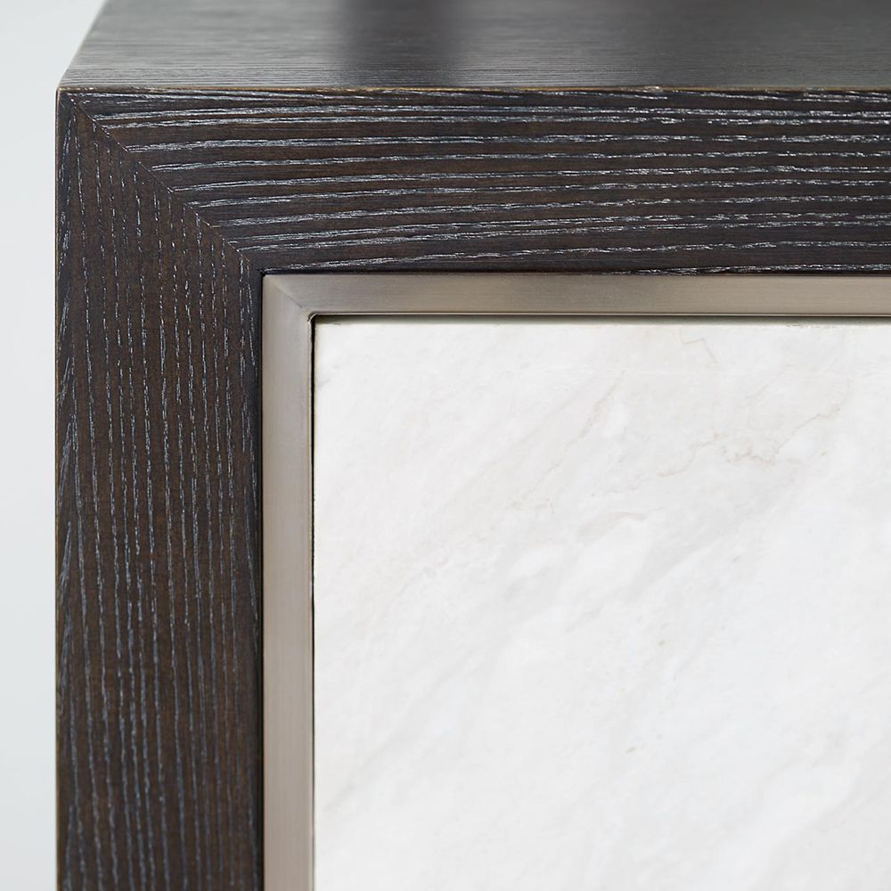 A luxurious buffet featuring a dark brown finish, stainless steel frame and laminated marble front