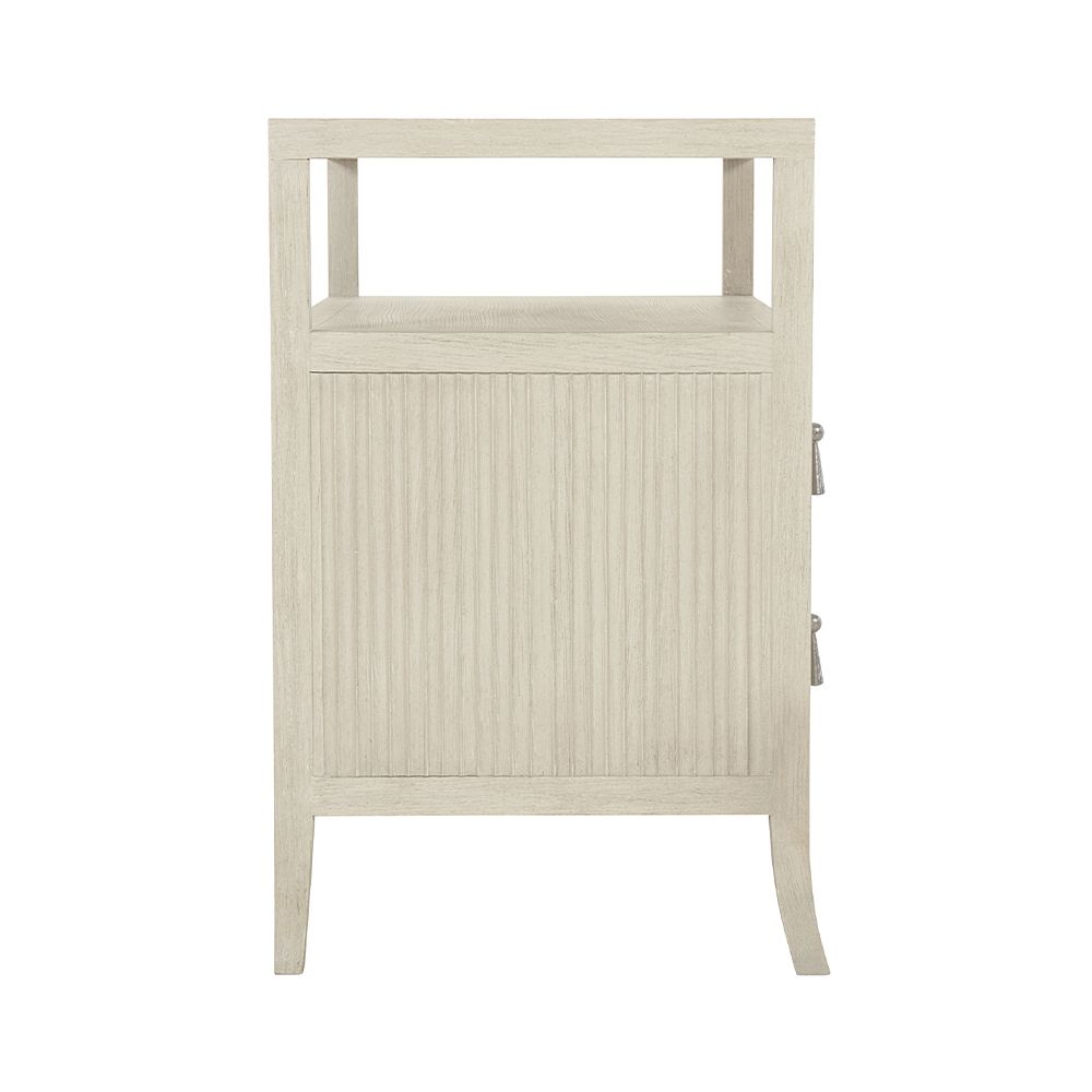 A beautiful two drawer bedside table with sophisticated indented drawer fronts