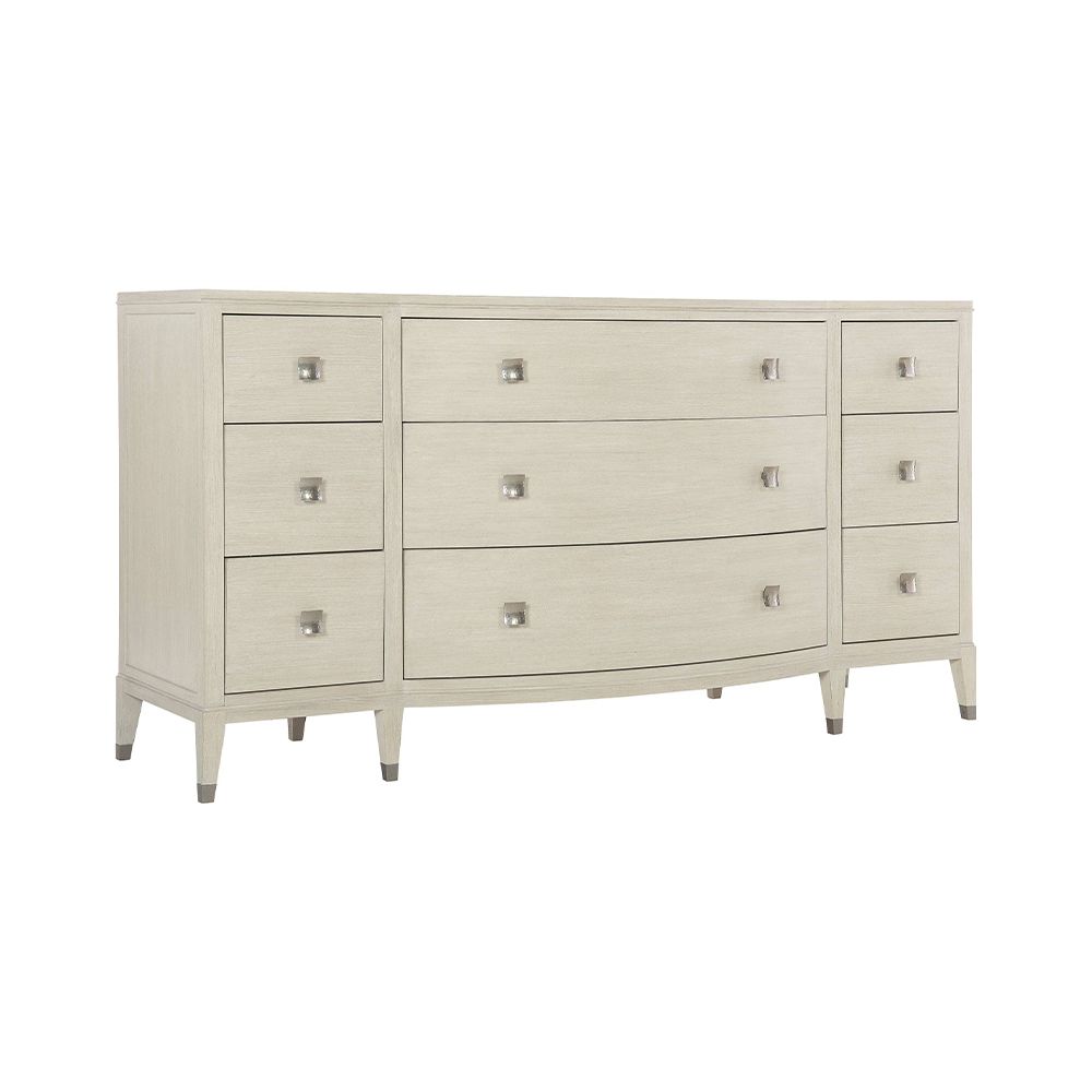 A gorgeous dresser from Bernhardt with a natural finish, tarnished nickel accents and nine drawers