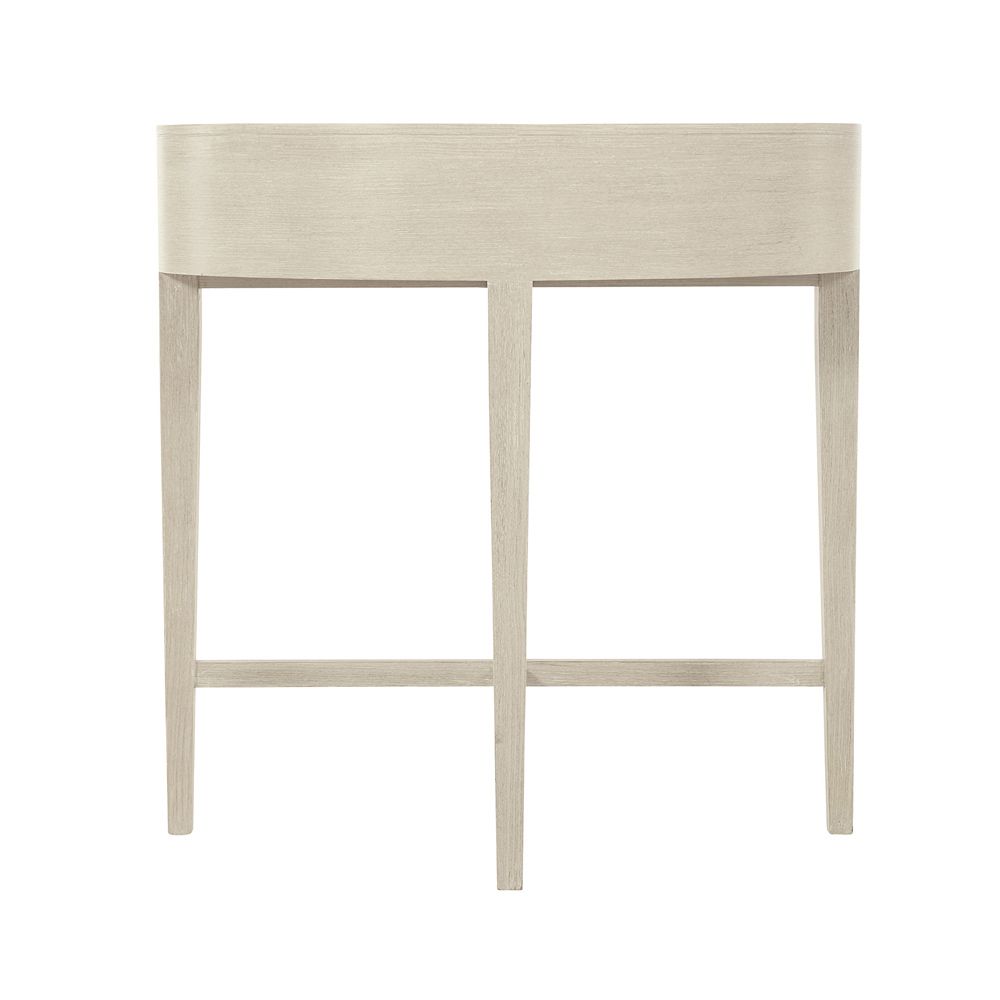 A lovely natural wood, one-drawer bedside table with nickel accents