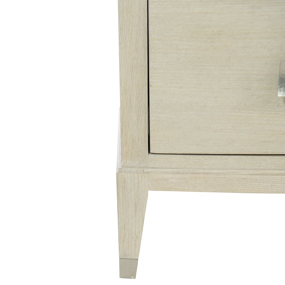 A beautiful chest of drawers from Bernhardt with five drawers and tarnished nickel handles 