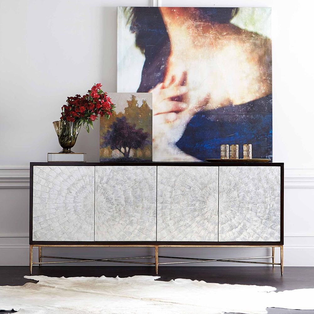 A mesmerising expresso coloured sideboard with an iridescent bronze finish, two pairs of doors, a removable shelf and three drawers