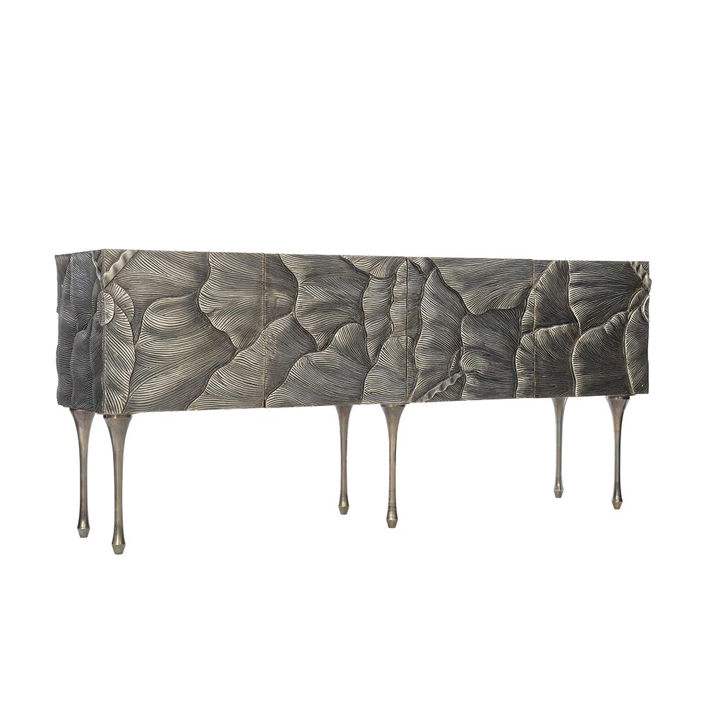 A textured statement sideboard with four unique doors, six sleek metal legs and an abundance of internal storage 