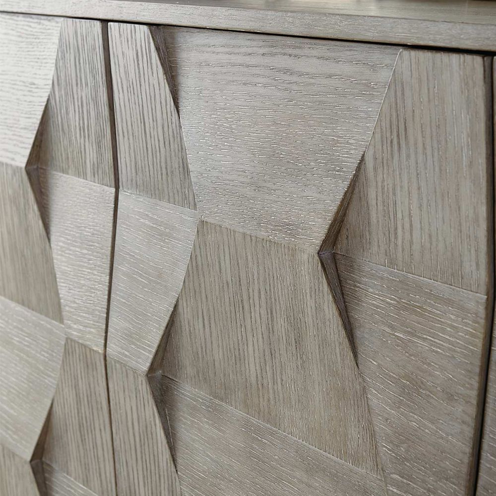A luxurious and sophisticated eight drawer dresser with a unique dimensional design 