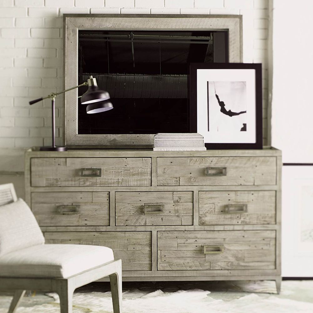 A lovely greige rectangular mirror with a wooden inner frame and metal outer frame