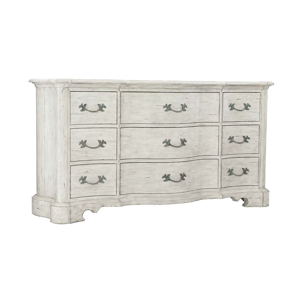 A beautiful and classic French style dresser with nine drawers and lovely curved front and ends from Bernhardt 
