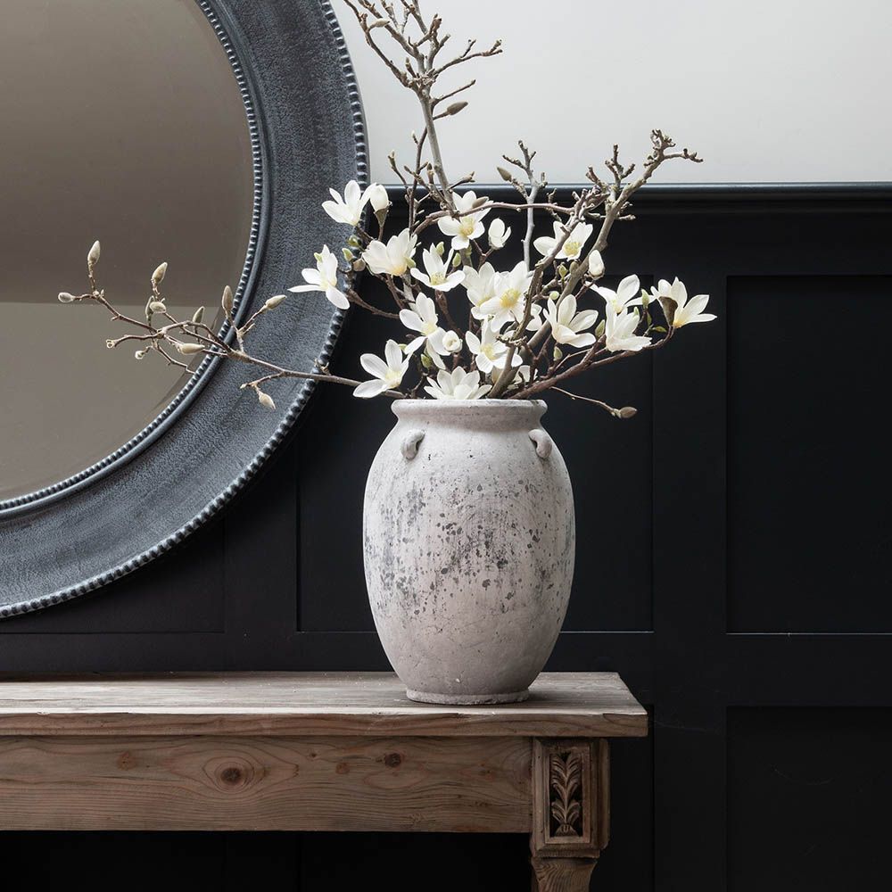 Charismatic distressed finish vase in grey