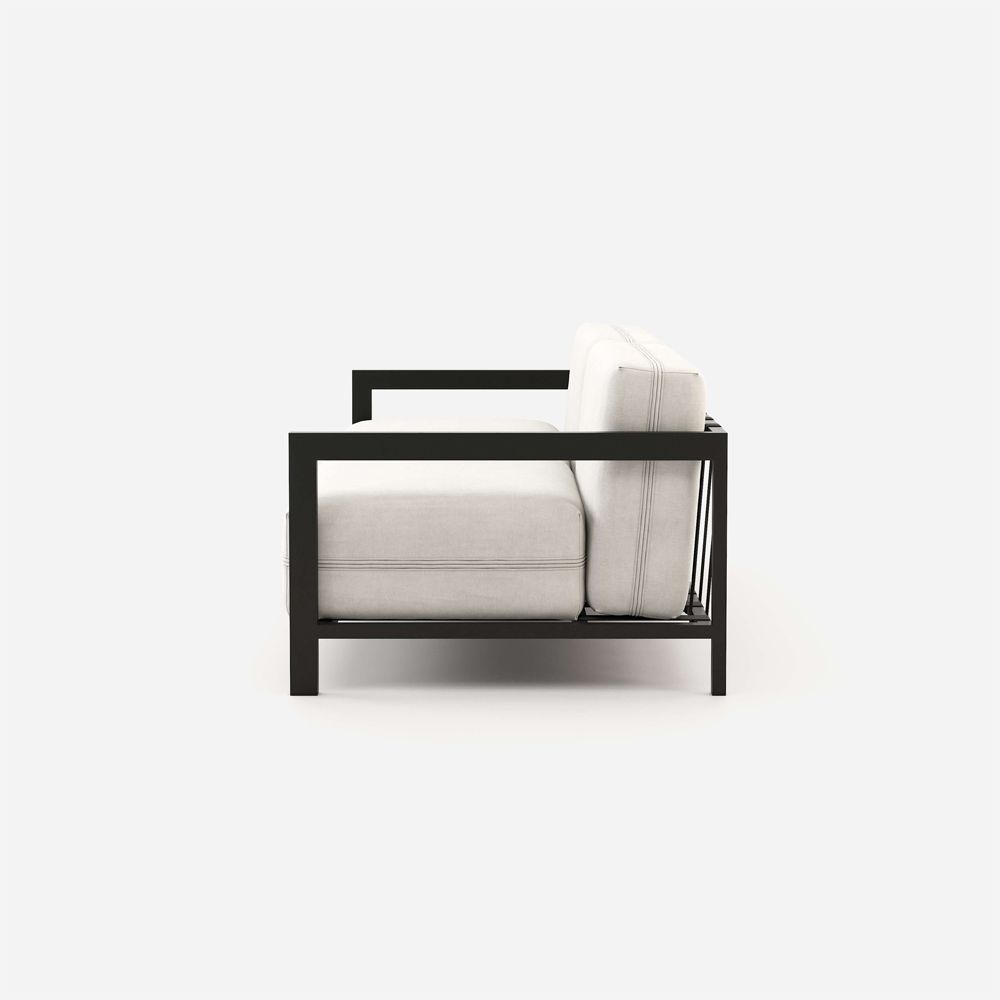 Modern, white outdoor sofa with brown frame armrests