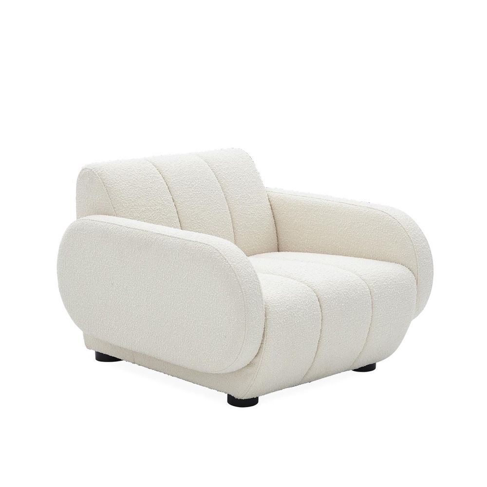 Luxurious white boucle fabric armchair with deep seating and black legs