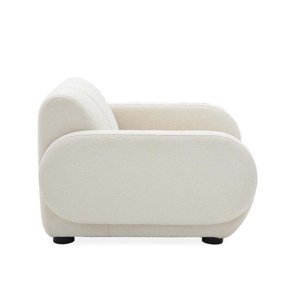 Luxurious white boucle fabric armchair with deep seating and black legs