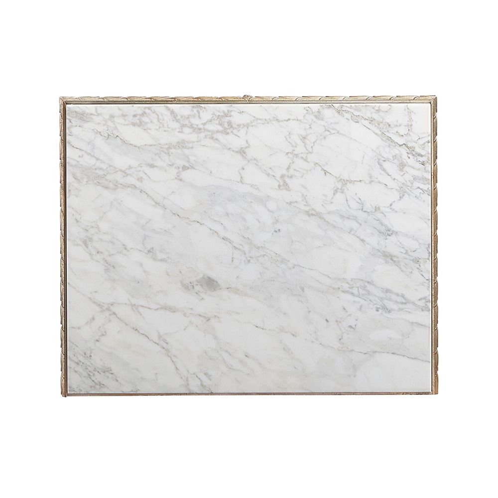 A luxury bedside table with a mirrored design, white marble top and glamorous gold detailing