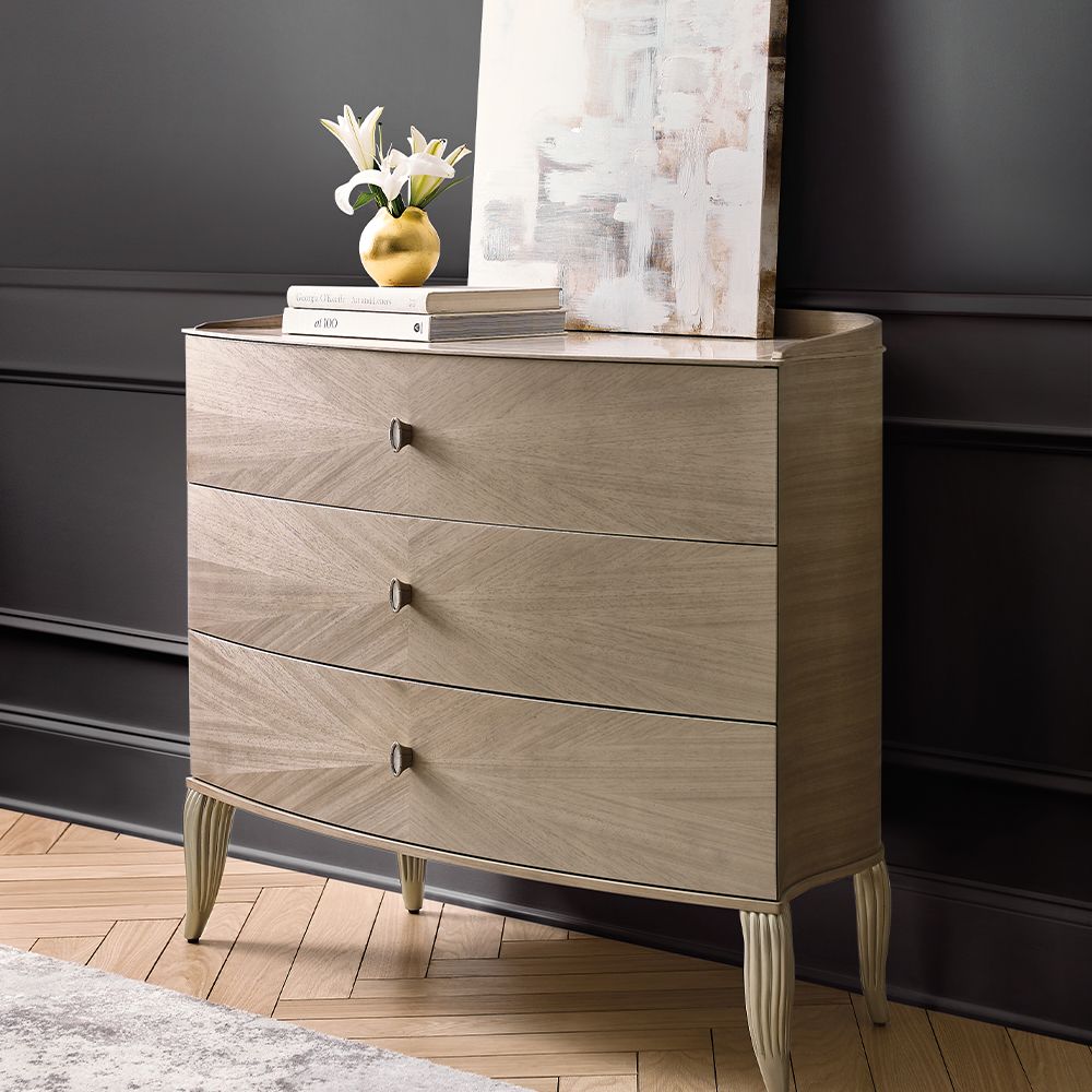 A modern and curvaceous chest by Caracole