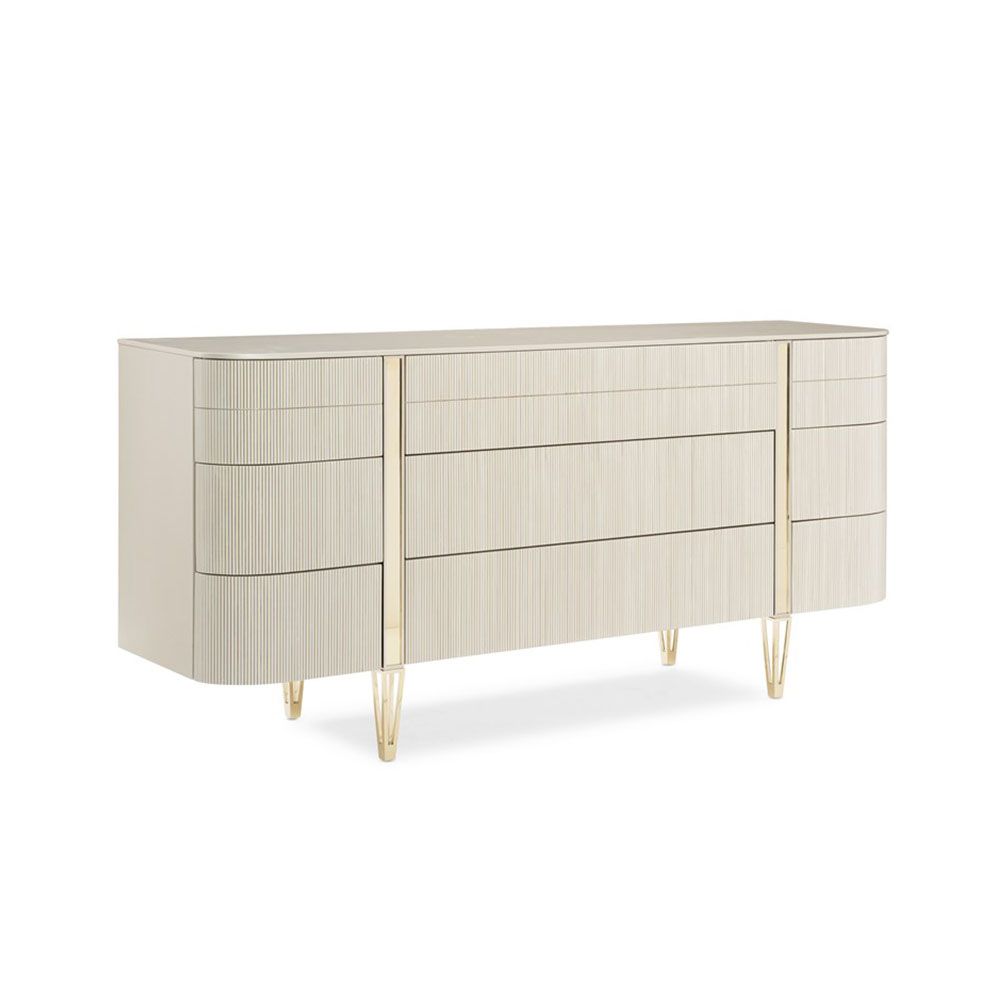 Elegant dresser with ribbed effect on drawers and captivating champagne gold details