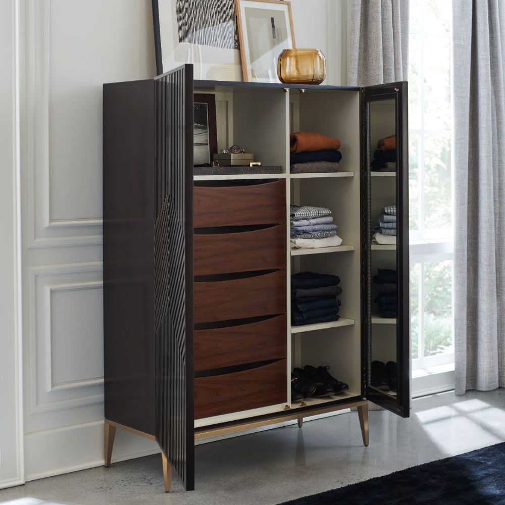 A luxury brown chest by Caracole with a champagne finish and an abundance of storage