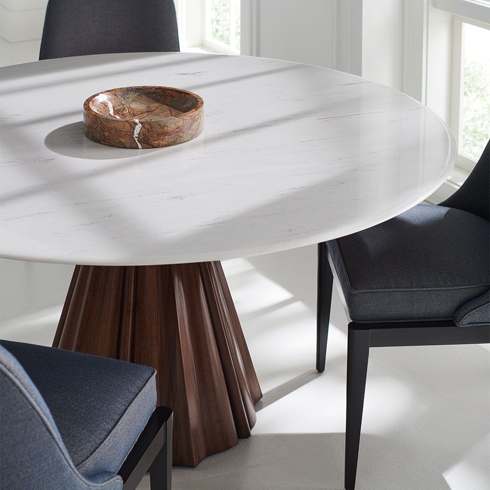 Striking round table with marble top and stylish, conical wooden base 