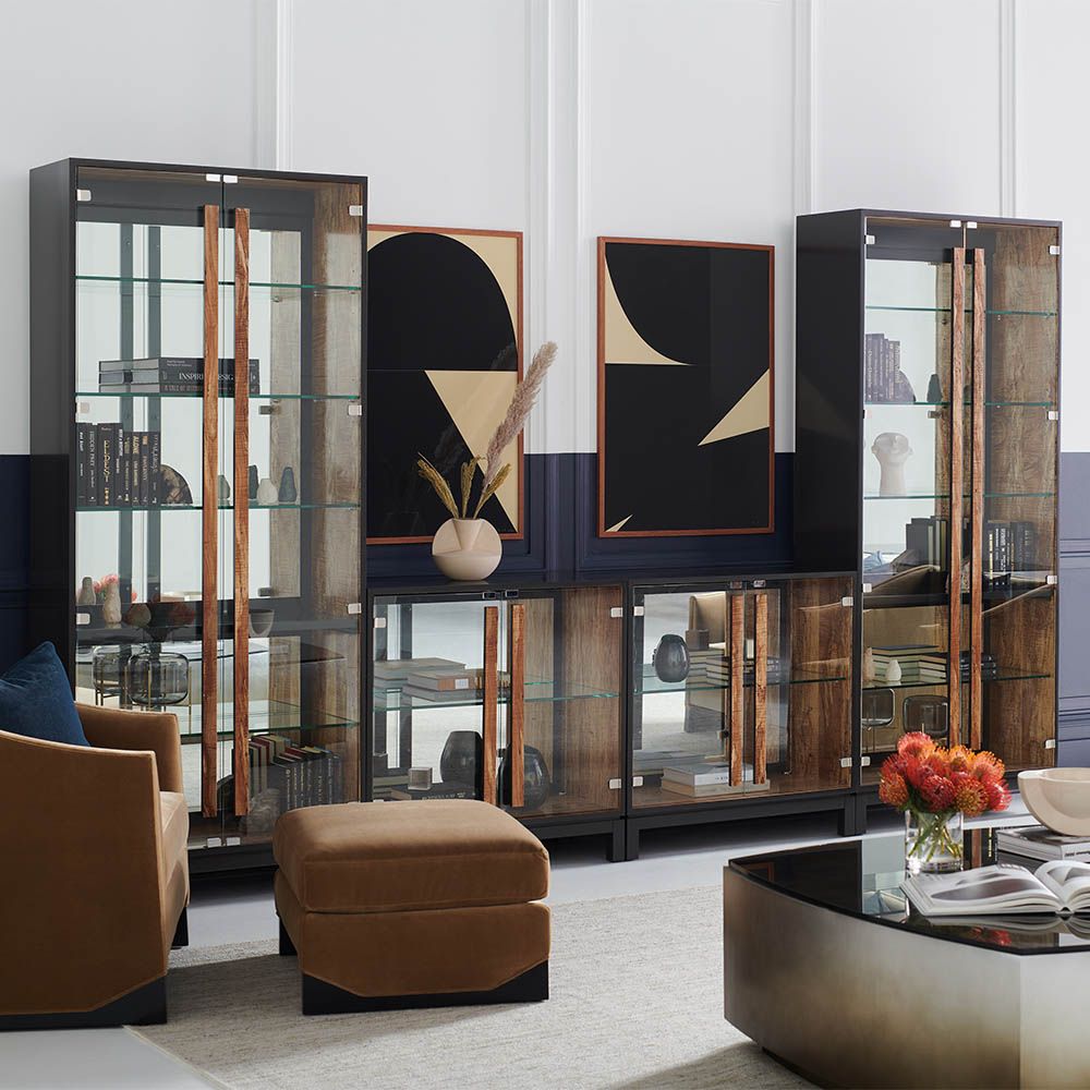 A dazzling modern cabinet with a rich mix of mirror, glass and wood textures