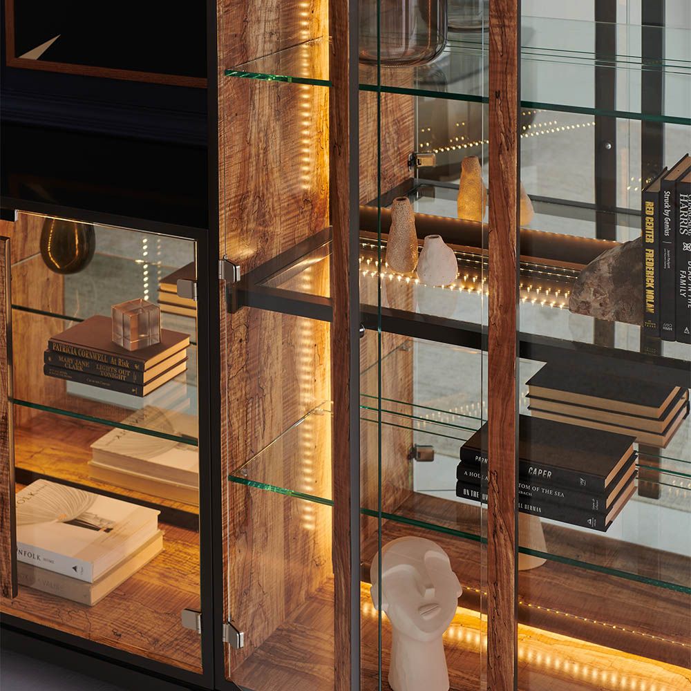 A dazzling modern cabinet with a rich mix of mirror, glass and wood textures