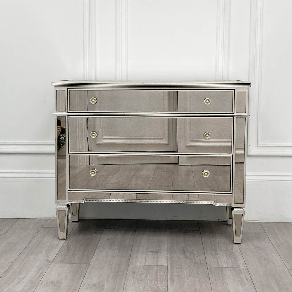 Stunningly glamorous chest of drawers with minor crack on glass of middle drawer