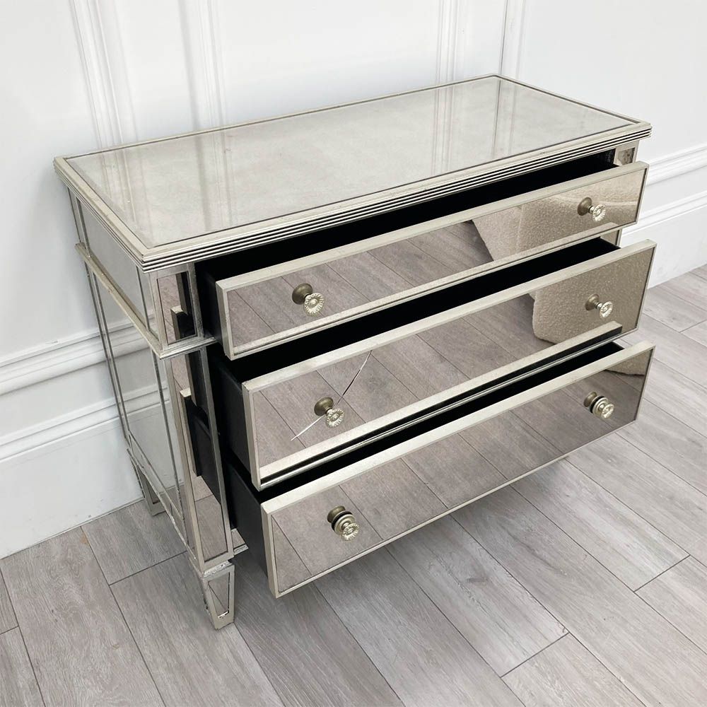 Stunningly glamorous chest of drawers with minor crack on glass of middle drawer