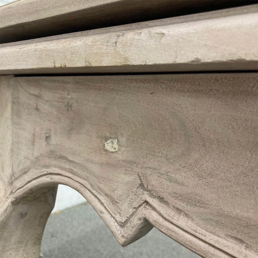 French-style dining table with parquet detailed surface and some imperfections