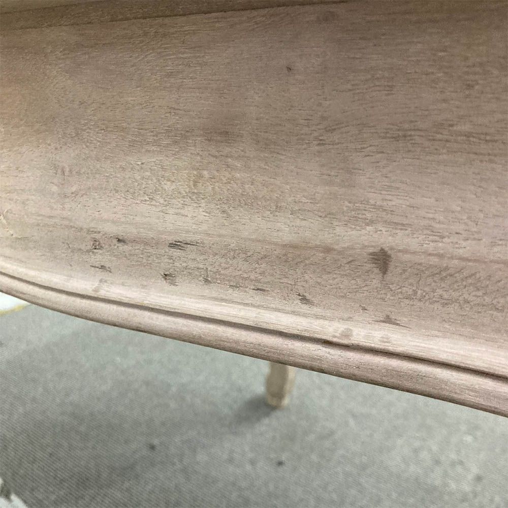 French-style dining table with parquet detailed surface and some imperfections