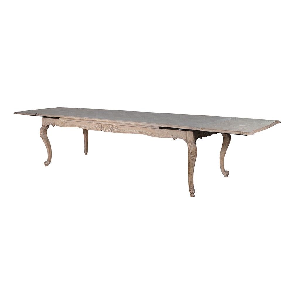 French-style dining table with parquet detailed surface and some imperfections