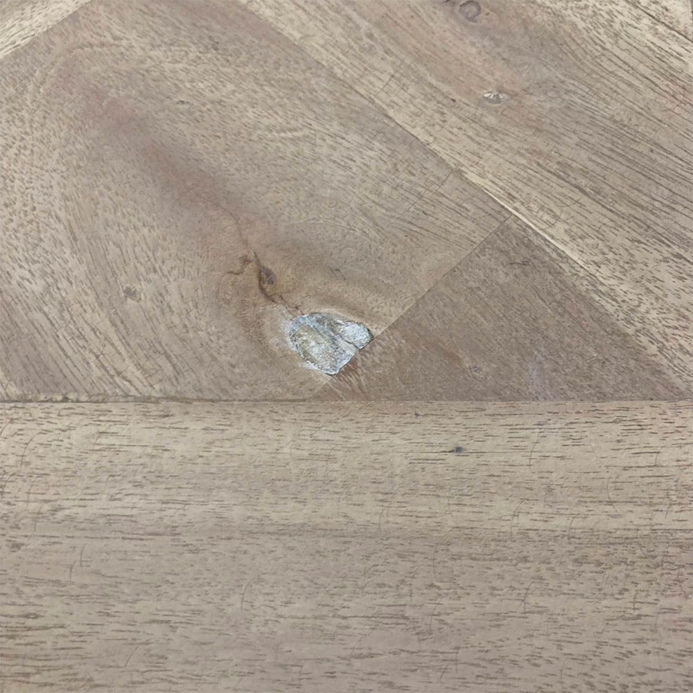 French-style dining table with parquet detailed surface and some imperfections