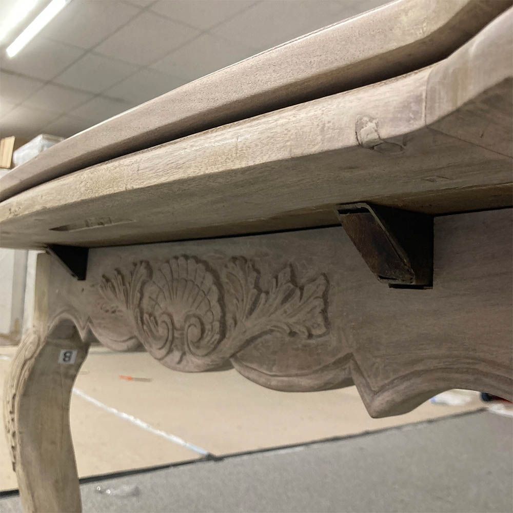 French-style dining table with parquet detailed surface and some imperfections