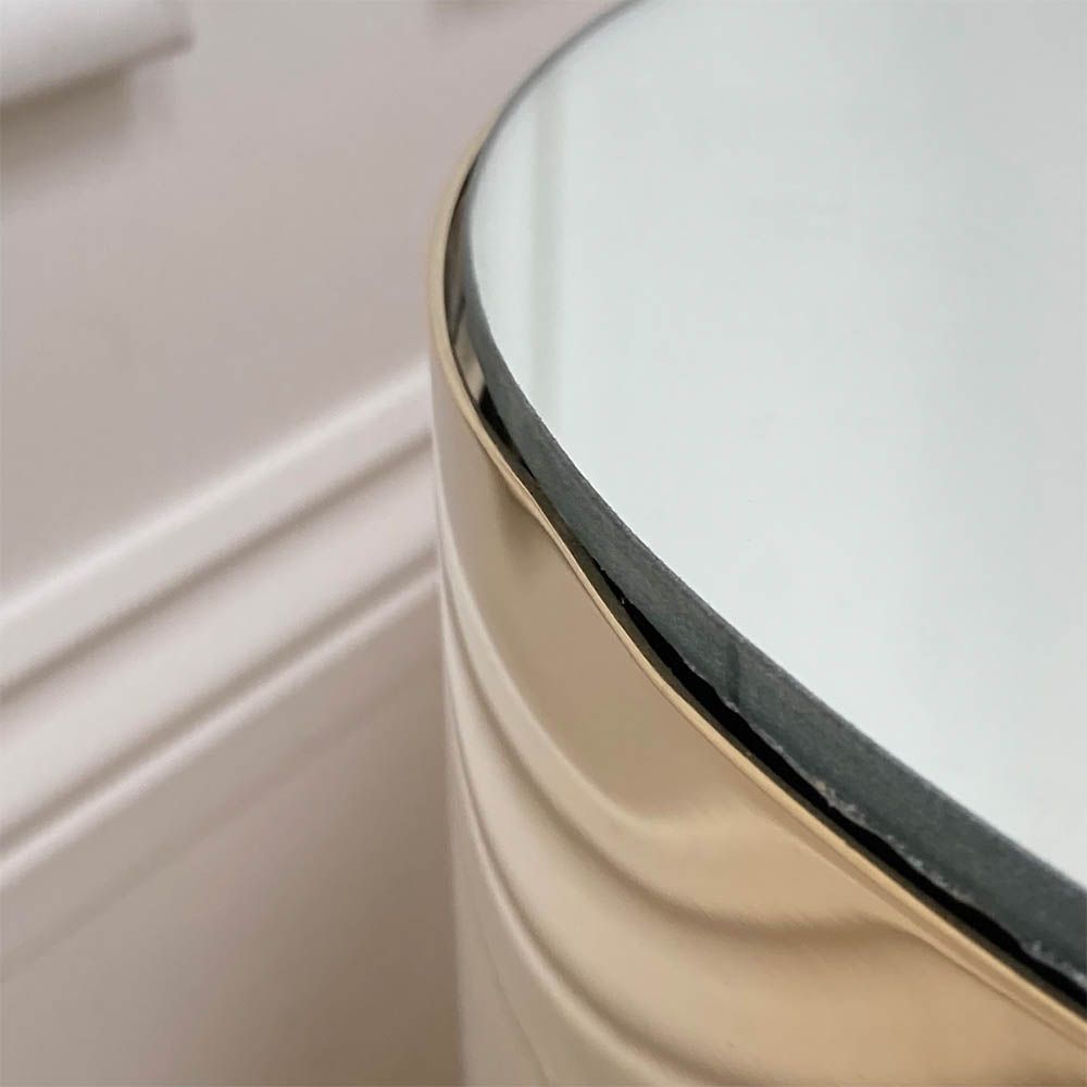 dent on side of tallest table