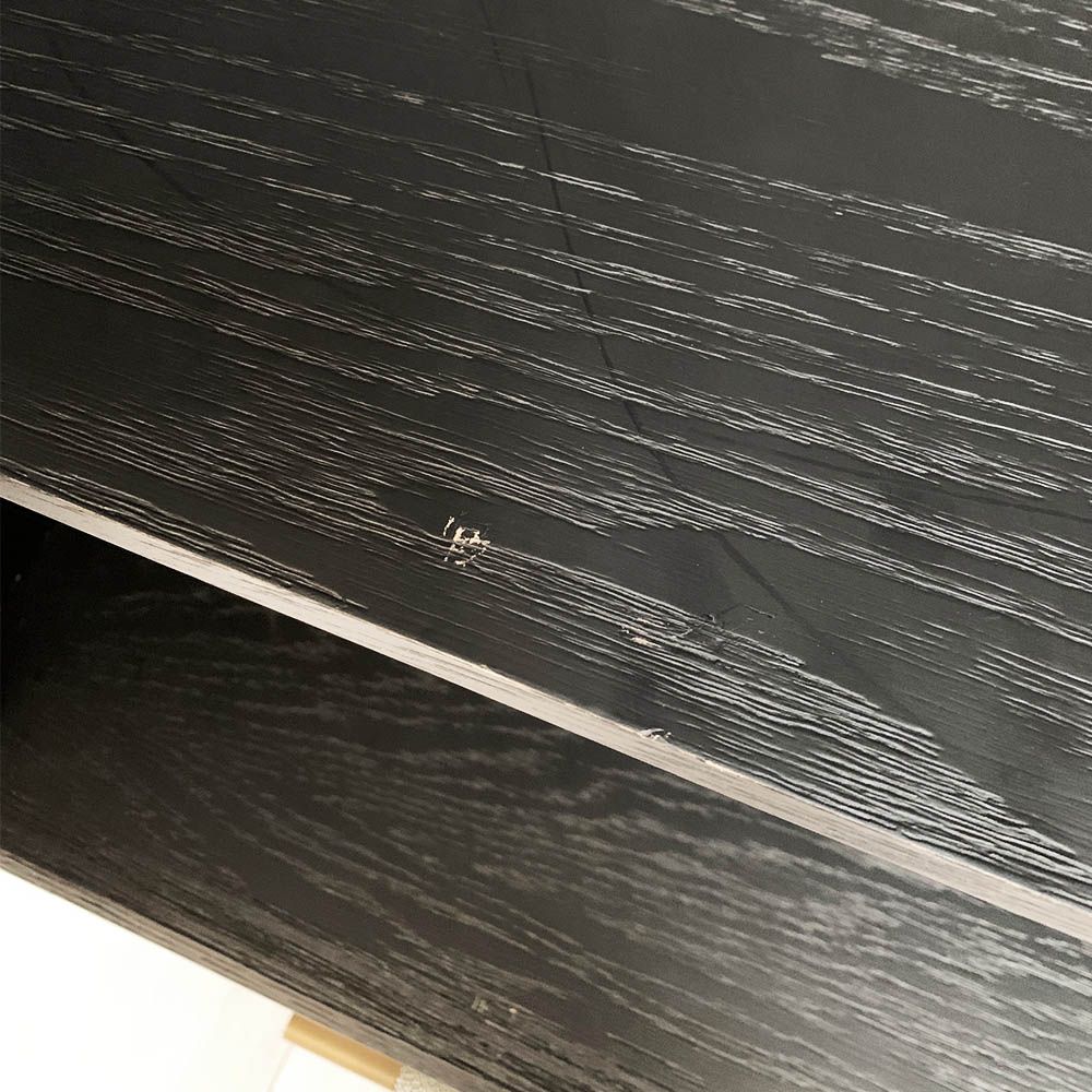 A luxurious grey shagreen wardrobe with antique brass and black detailing 