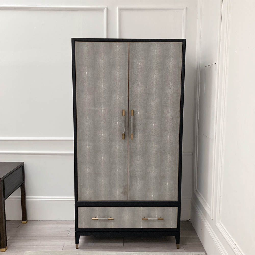 Grey shagreen finish wardrobe complemented by brass accents