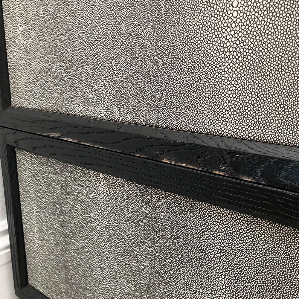 Grey shagreen finish wardrobe complemented by brass accents