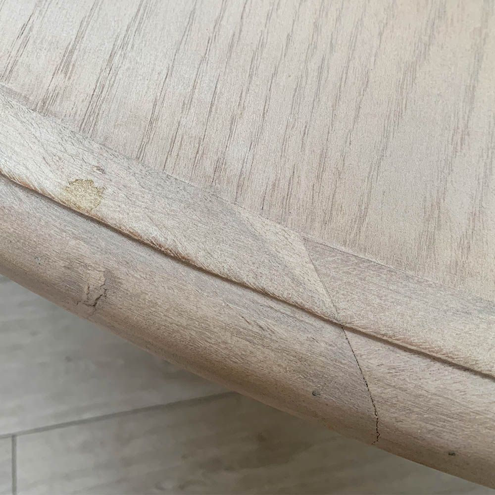 crack and mark on edge of table top