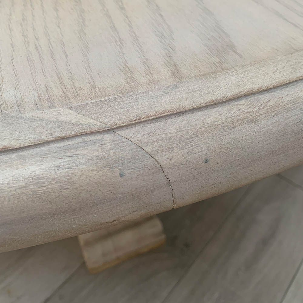 crack and mark on edge of table top