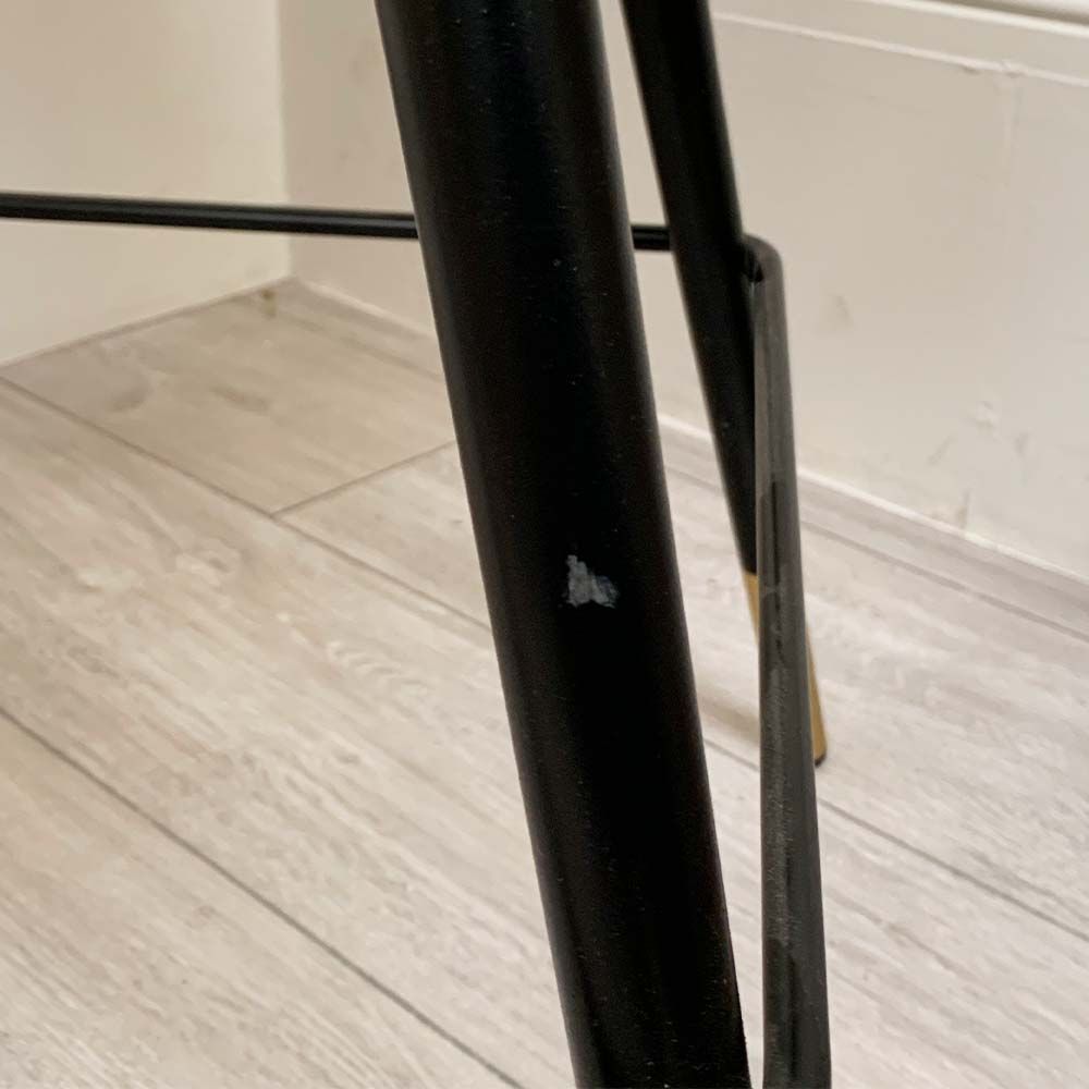 A pair of pink velvet mid-century counter stool with black faux leather piping and golden feet caps