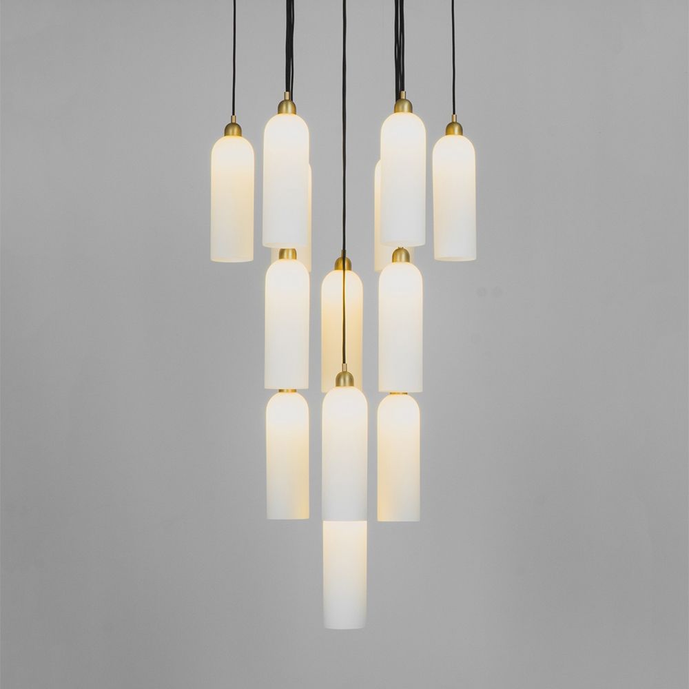 A luxurious chandelier by Schwung with translucent opal glass lampshades and a solid brass structure