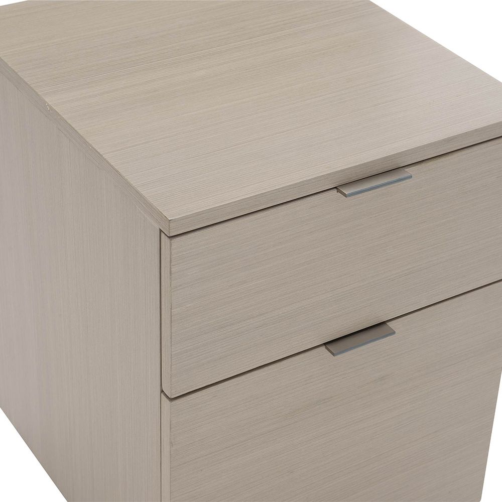 A luxury file cabinet by Bernhardt with two drawers and casters