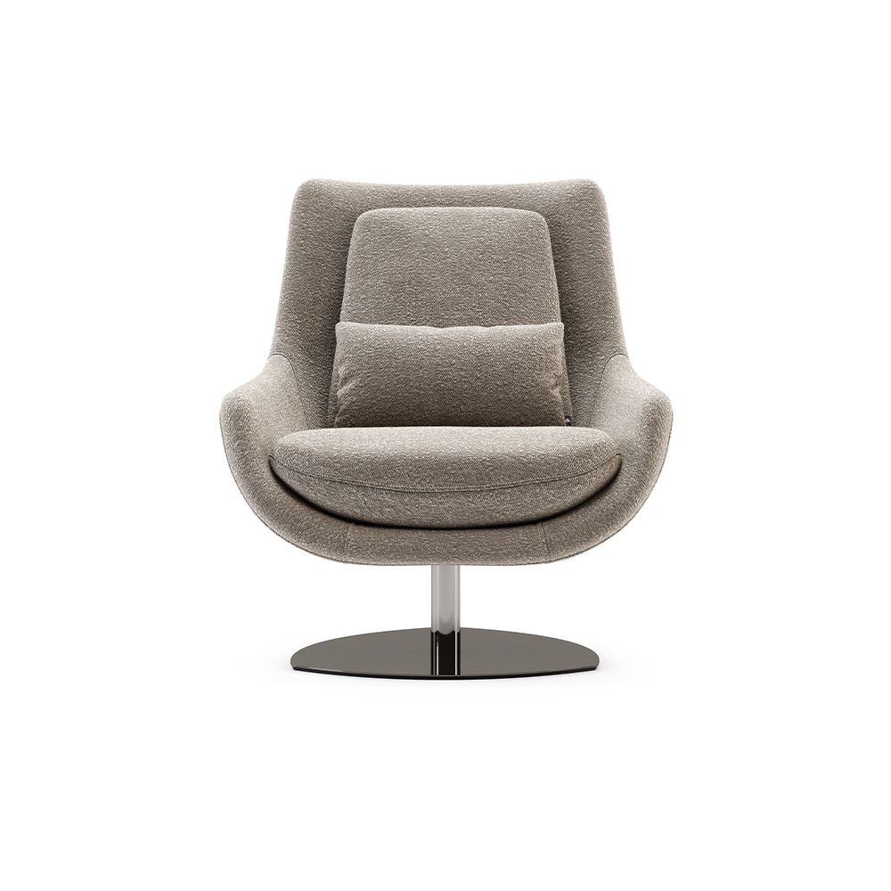A luxurious armchair by Domkapa with a polished base