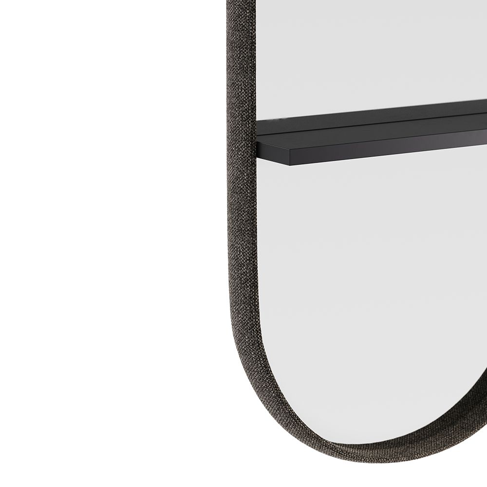 A luxurious mirror in a fabric finish with a wooden shelf - available in small and large