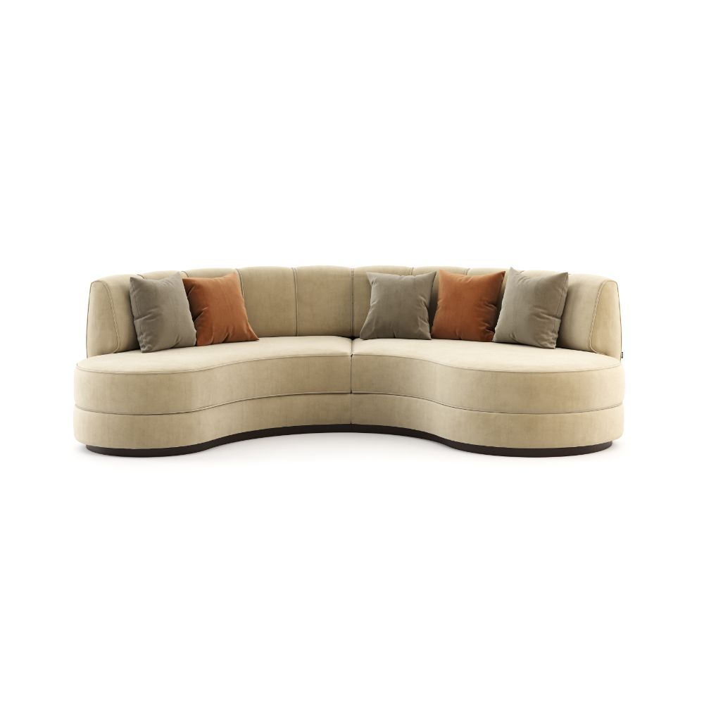 A luxurious beige velvet curved, contemporary design sofa 