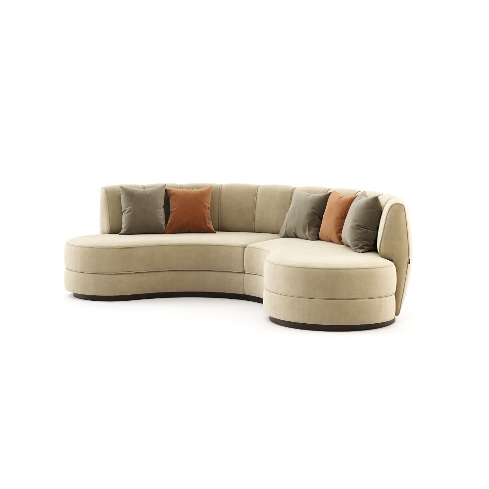 A luxurious beige velvet curved, contemporary design sofa 