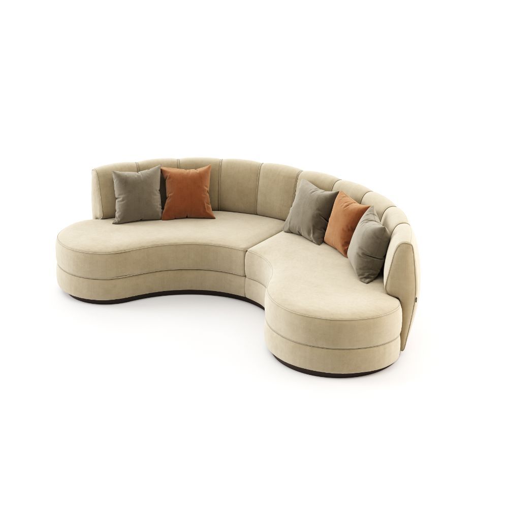 A luxurious beige velvet curved, contemporary design sofa 