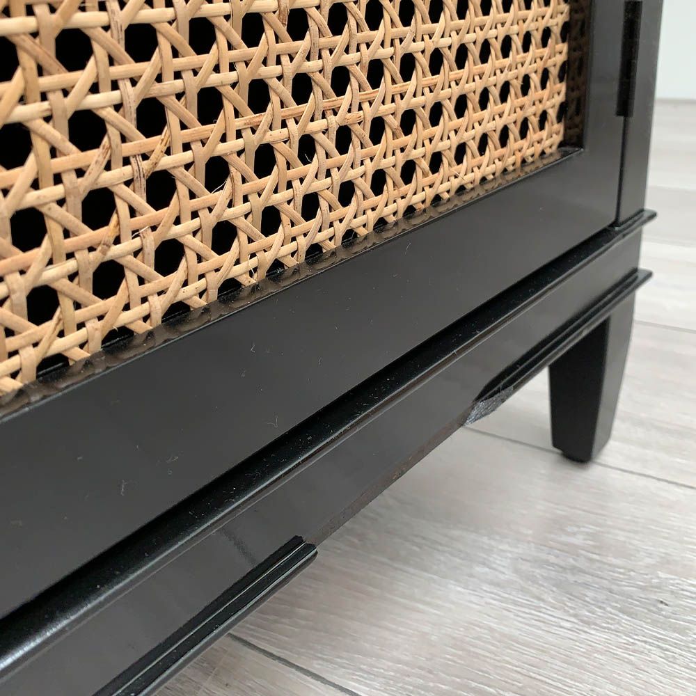 Chipped frame on the bottom of the sideboard