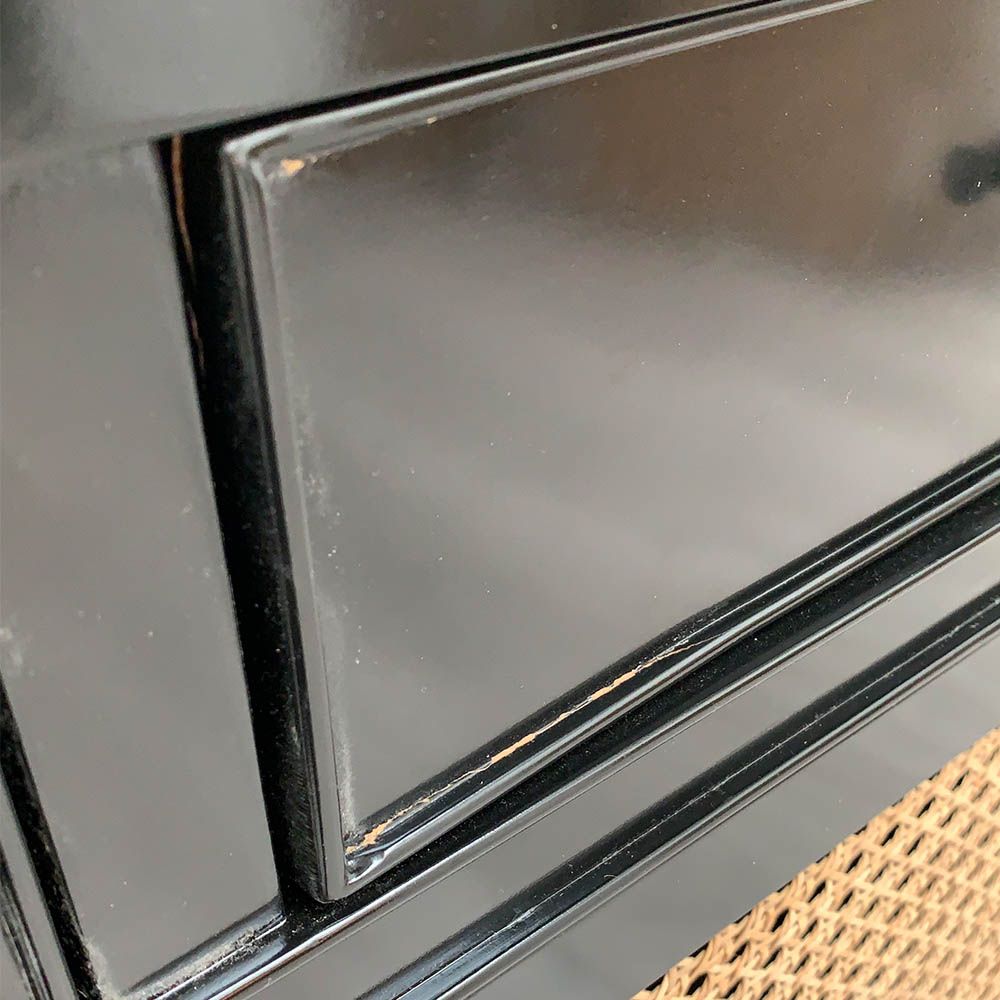 Imperfections to black lacquer finish
