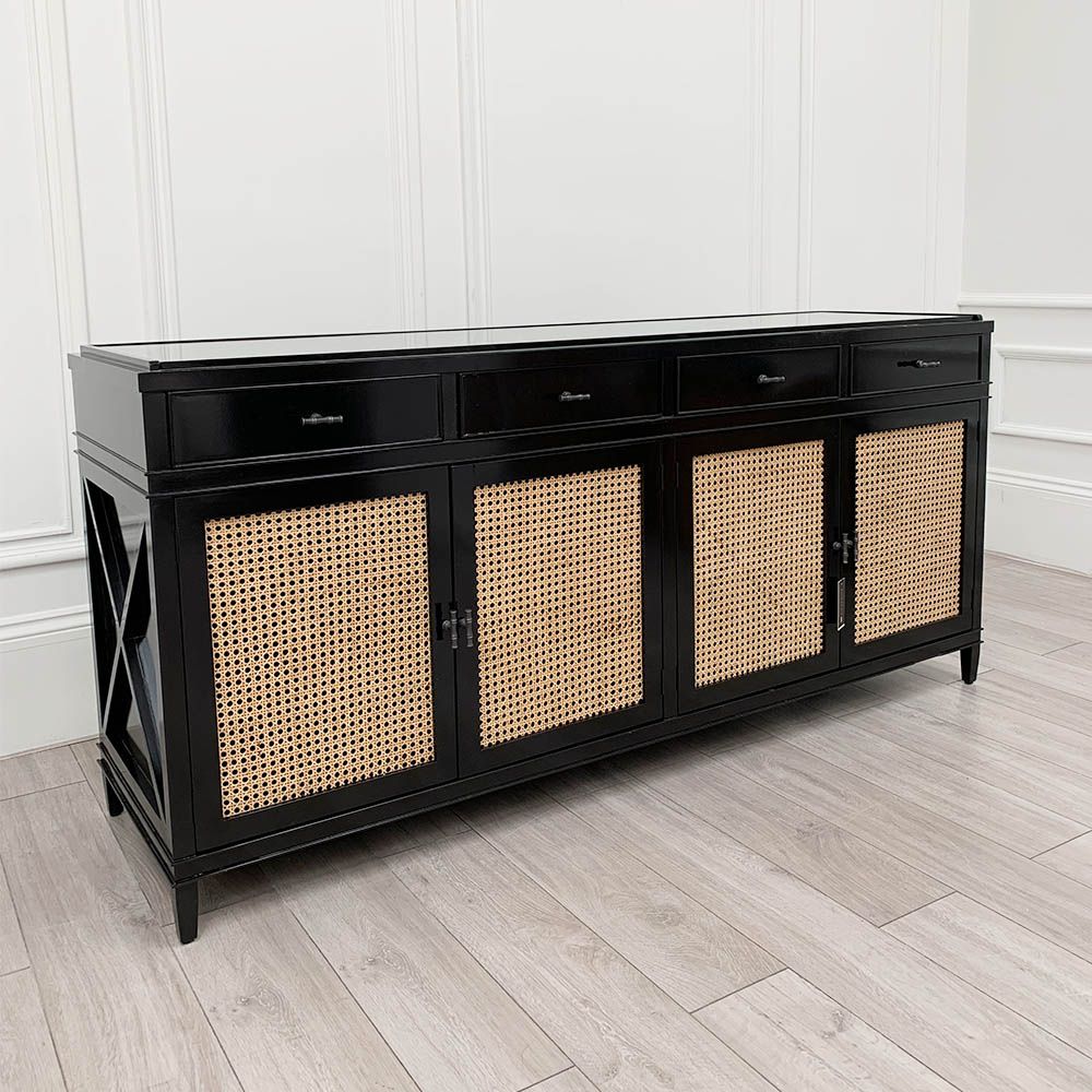 A fabulous, sleek sideboard, featuring four beautiful woven cane doors, and a tempered glass top. 