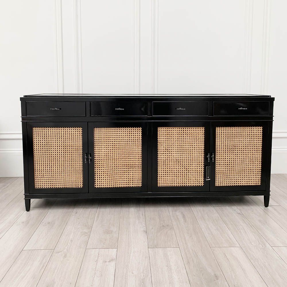 A fabulous, sleek sideboard, featuring four beautiful woven cane doors, and a tempered glass top. 