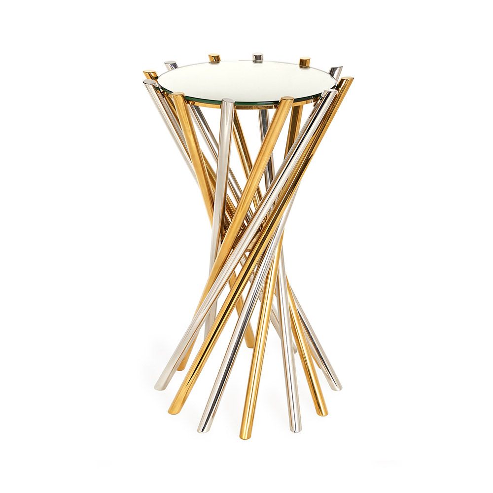 a glamorous nickel and brass table with a mirrored surface 